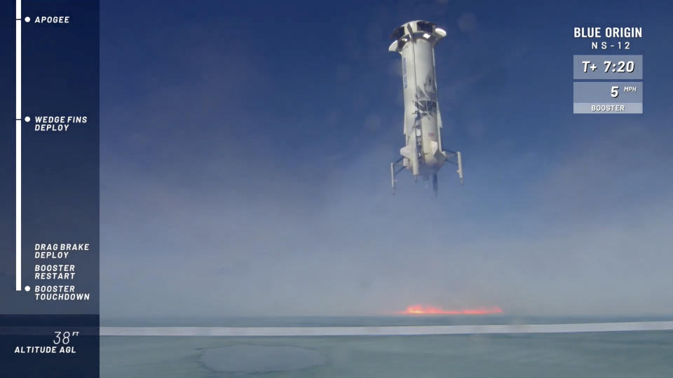 In this image taken from video provided by Blue Origin, the New Shepard rocket booster lands near Van Horn, Texas. Blue Origin, Jeff Bezos' space company, has scored another successful spaceflight, when it launched and landed the same rocket for the sixth time Wednesday. (Blue Origin via AP)