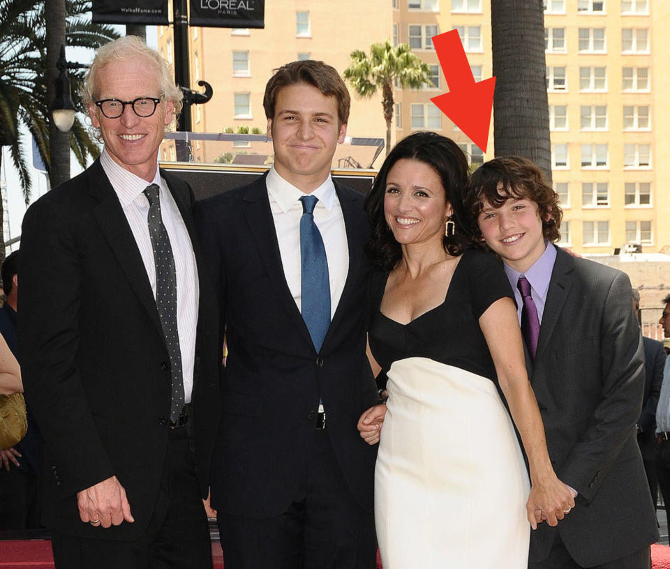 the family of 4 on a red carpet