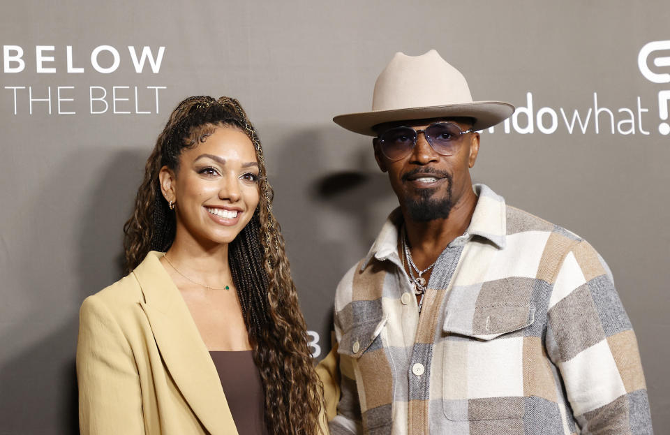 American actor Jamie Foxx (R) and his daughter American producer Corinne Foxx arrive for the Los Angeles premiere 