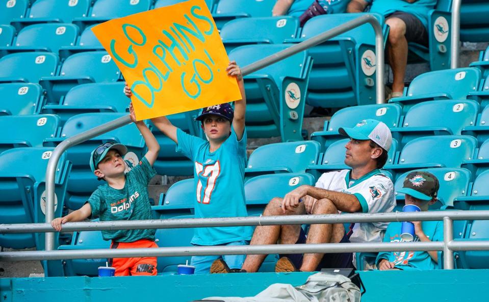 Miami Dolphins fans cheer on the team before a preseason game at Hard Rock Stadium on Friday, August 11, 2023, in Miami Gardens, FL.