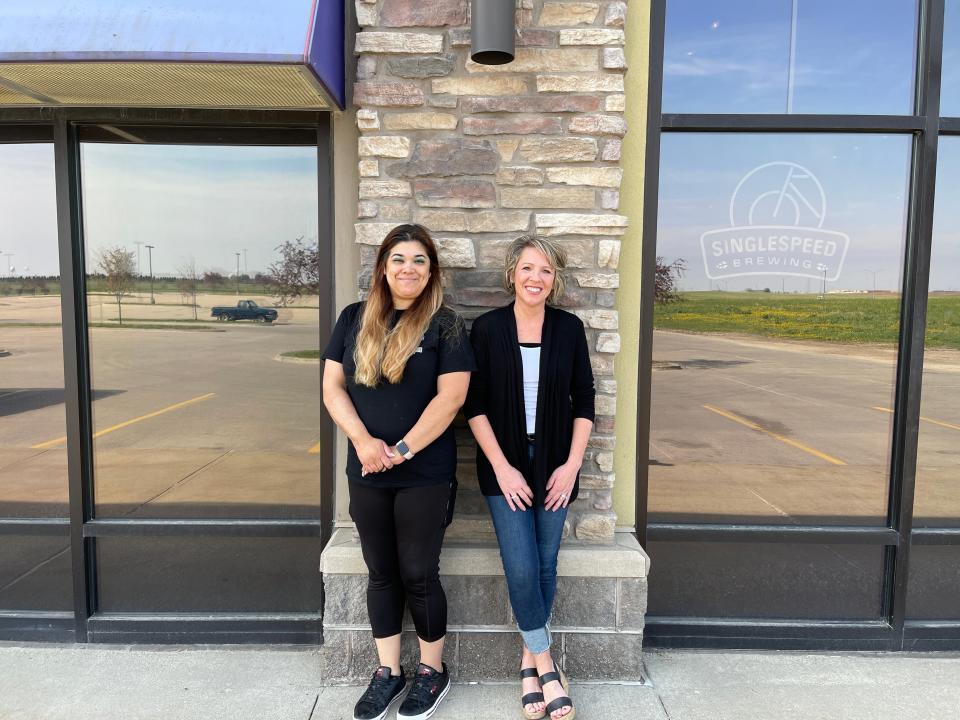 Christine Rodriguez's real estate agent, Tiffany Ehler, right, says she's never experienced such an overheated housing market in Des Moines, Iowa.