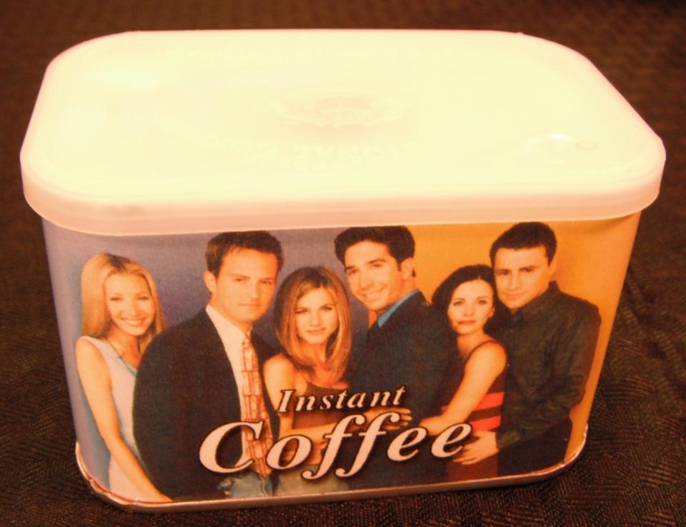 Friends instant coffee canister with photo of characters Phoebe, Chandler, Rachel, Ross, Monica, Joey.