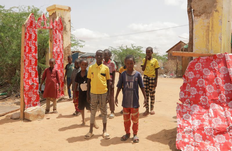 Bashir Nur Salat poses for a photograph at the Kabasa Primary School, in Dollow