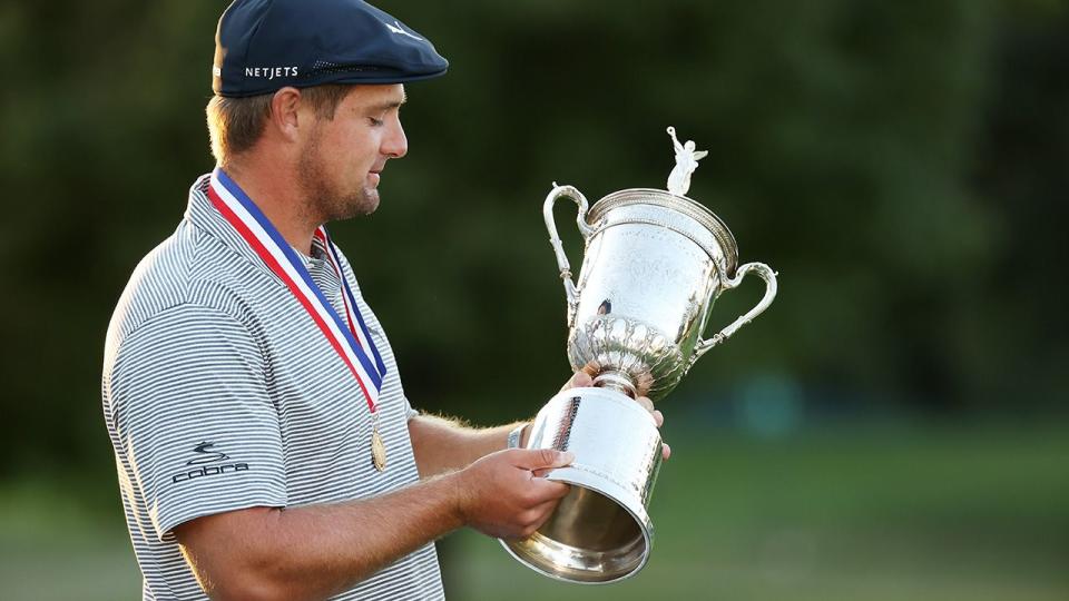 Bryson DeChambeau is seen here holding his 2020 US Open trophy.