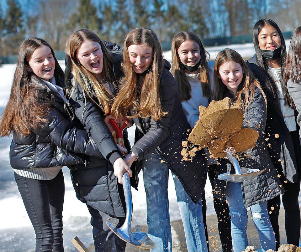Students help celebrate the groundbreaking for the new South Middle School on Wednesday, Feb. 9, 2022.