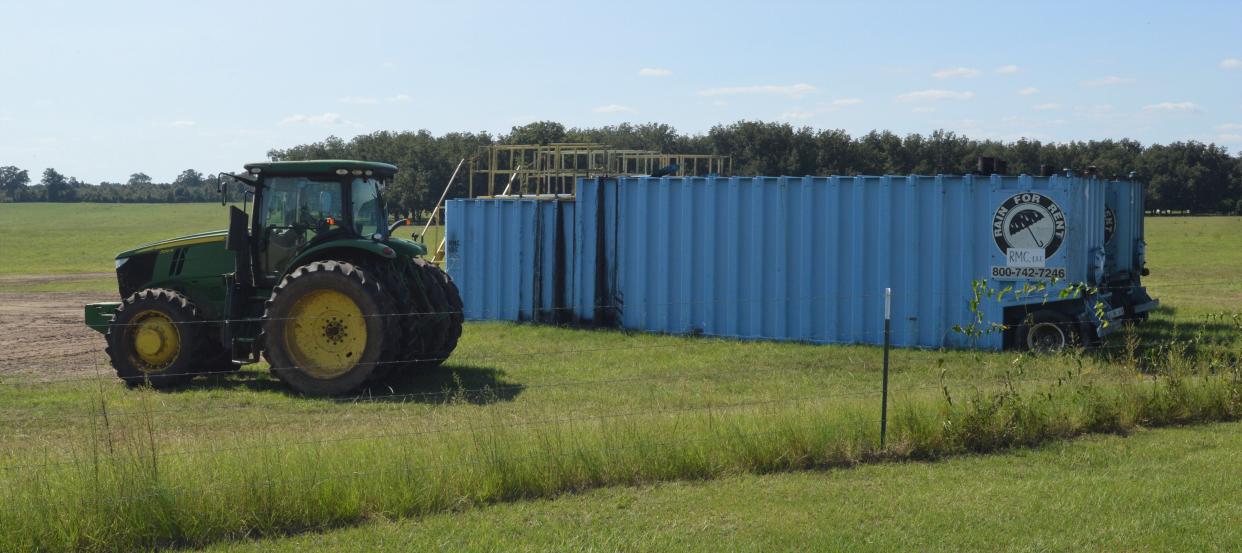 Tractors are being used to spread soil amendments on property on sites throughout Jefferson County, Georgia.