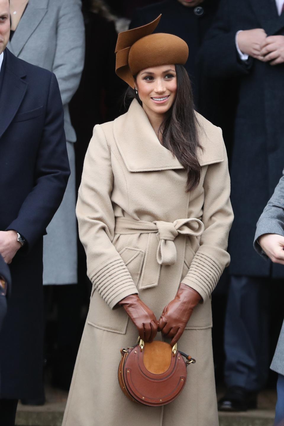 The duchess wearing Marks & Spencer gloves on Christmas Day in 2017