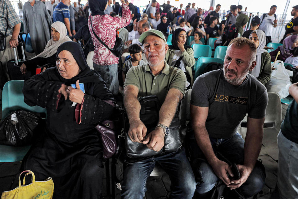 Scores of foreign passport holders trapped in Gaza started leaving the war-torn Palestinian territory on November 1 when the Rafah crossing to Egypt was opened up for the first time since the Oct. 7 Hamas attacks on Israel (Mohammed Abed / AFP - Getty Images)