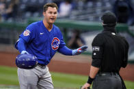 Chicago Cubs' Joc Pederson, left, disagrees with a third-strike call by umpire Will Little during the first inning of the team's baseball game against the Pittsburgh Pirates in Pittsburgh, Saturday, April 10, 2021. (AP Photo/Gene J. Puskar)