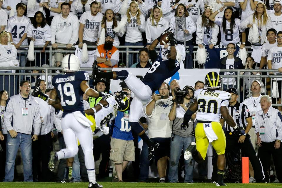 Penn State's Allen Robinson makes one of the most memorable catches in Penn State history to help the Lions tie Michigan during a white out game in 2013. The Lions went on to win in four overtimes.