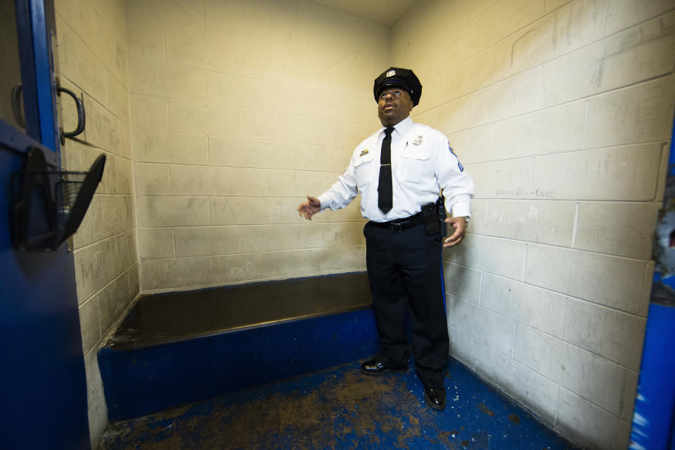 In this Friday, Oct. 26, 2018, photo, Philadelphia Police Sgt. John Ross discusses the Police 9th District's juvenile holding cell in Philadelphia. Bloomberg Philanthropies announced the winners Monday of the U.S. Mayors Challenge that asked cities to develop innovative solutions to their biggest problems that other cities could copy. Philadelphia plans to build a juvenile justice hub designed to make contact with police less traumatic, keep more children out of the criminal justice system and connect at-risk juveniles with intervention services at a crisis point that could change their lives. (AP Photo/Matt Rourke)