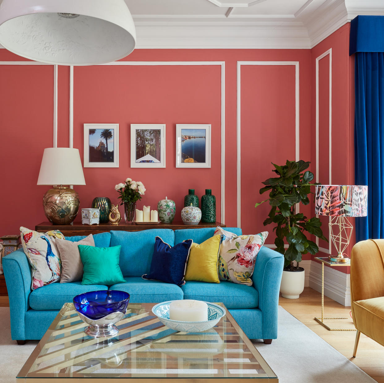  blue sofa pink walls living room 