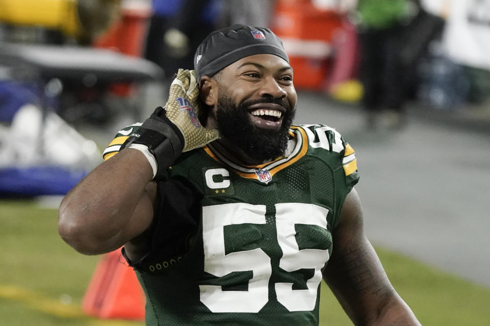 Green Bay Packers' Za'Darius Smith listens to the cheering of fans after an NFL divisional playoff football game Saturday, Jan. 16, 2021, in Green Bay, Wis. The Packers defeated the Rams 32-18 to advance to the NFC championship game. (AP Photo/Morry Gash)