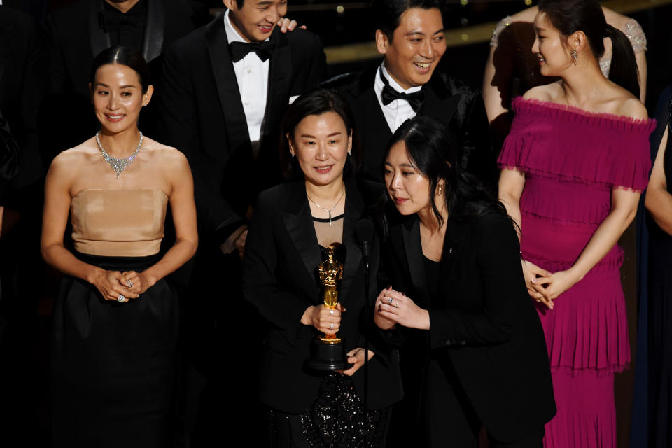 Sharon Choi with Parasite executive producers Min Heoi Heo and Miky Lee accepting the Best Picture award for Parasite at the 92nd Annual Academy Awards. (Photo: Kevin Winter/Getty Images)