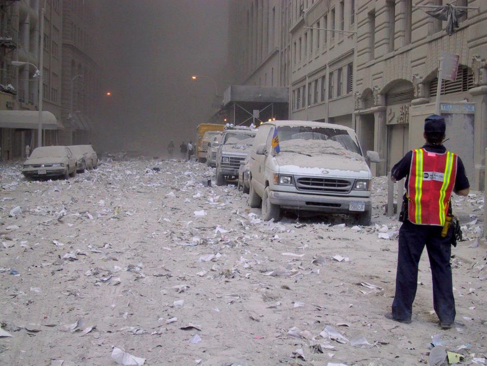 Ash covers a street in downtown New York City after the collapse of the World Trade Center following a terrorist attack Tuesday, Sept. 11, 2001.