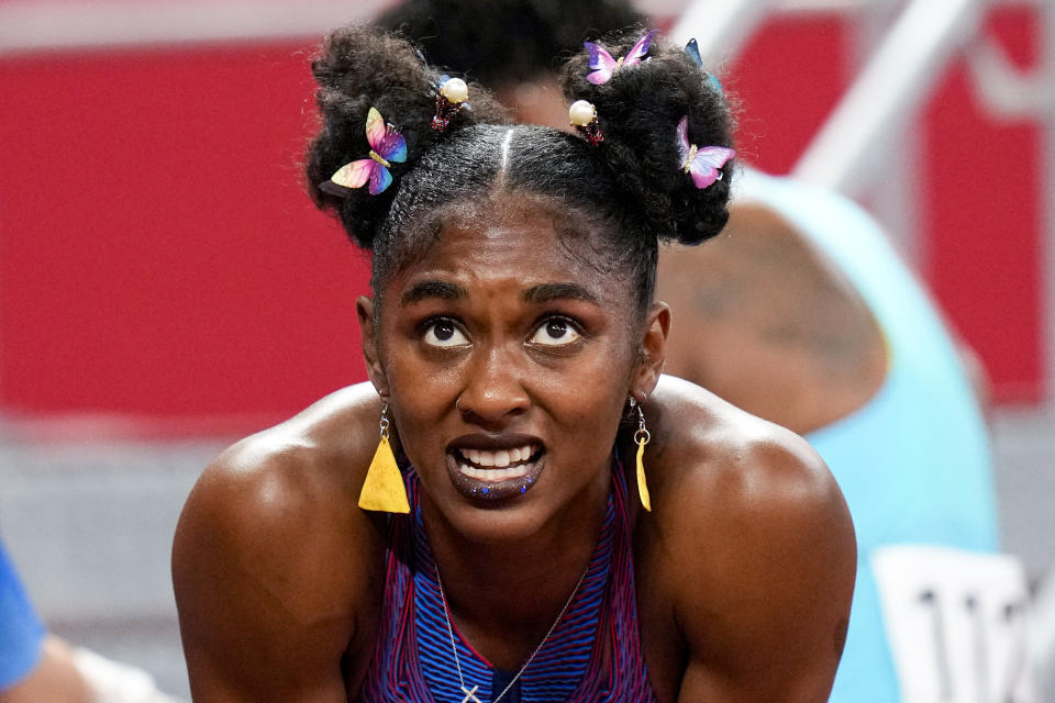FILE - Christina Clemons, of the United States, reacts after a women's 100-meter hurdles semifinal at the 2020 Summer Olympics, Sunday, Aug. 1, 2021, in Tokyo. U.S. Olympic hurdler Christina Clemons sent email after email raising concerns over a gap in health-care insurance coverage for new mothers who still wanted to compete. Those baby steps turned into big strides as USA Track and Field unveiled a program Thursday, April 25, 2024, that expands an existing maternity support system to give new moms even more time to return to an elite level. (AP Photo/Petr David Josek, File)