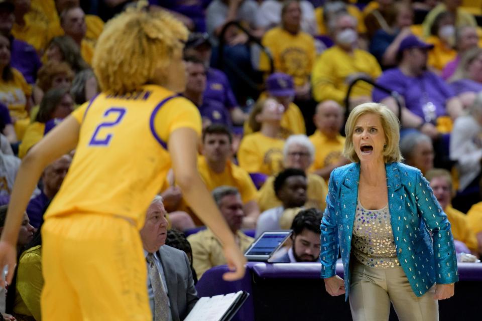 LSU head coach Kim Mulkey, right, reacts next to LSU guard Jasmine Carson (2) in the first half of an NCAA college basketball game against Mississippi State, Sunday, Feb. 26, 2023, in Baton Rouge, La. (AP Photo/Matthew Hinton)