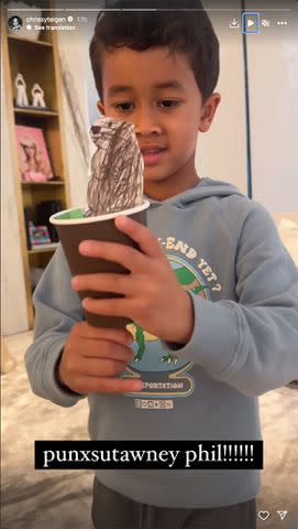 <p>Chrissy Teigen / Instagram</p> Chrissy Teigen's son Miles shows off his Groundhog Day craft