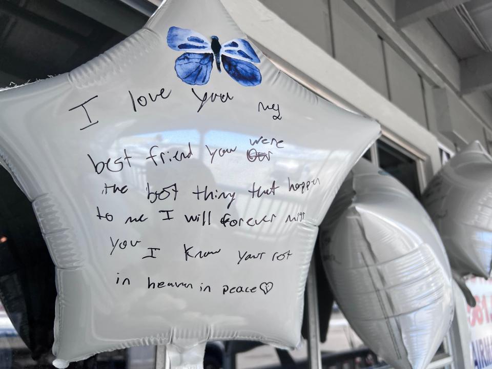 A memorial for Ana Diego Matias, 20, of Lantana, outside the Palm Beach County Park Airport flight school where she was training to be a pilot. Matias and 76-year-old Stanley Sands were killed in a plane crash May 26, 2023.