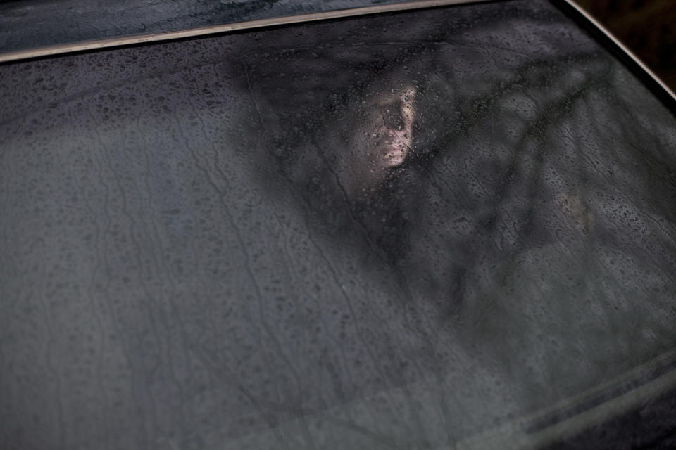 View of a car driver through a windshield