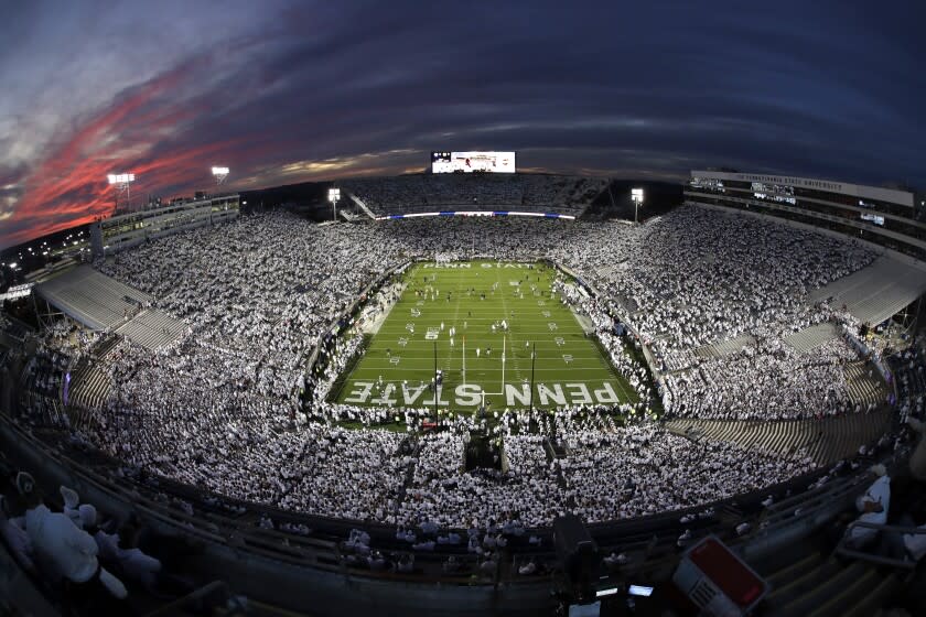 The sun sets on Beaver Stadium during warm ups before a game between Penn State and Michigan