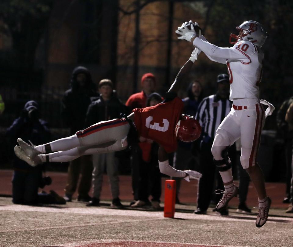 Max Leblanc of Baylor makes a touchdown catch while being guarded by Isaiah Cane of Brentwood Academy during their Division II-AAA semifinal playoff game at Brentwood Academy Friday, November 18, 2022.