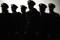 Philadelphia Fire Department cadets from Class 196 arrive for their graduation ceremony in Philadelphia, Wednesday, Nov. 13, 2019. These cadets will enable the department to start reopening companies that were closed during the Recession. (AP Photo/Matt Rourke)