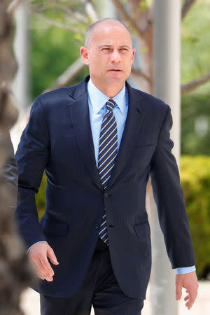 Attorney Michael Avenatti arrives to appear at the U.S. District Court to face embezzlement and fraud charges in Santa Ana, California, U.S., April 1, 2019. REUTERS/Mike Blake