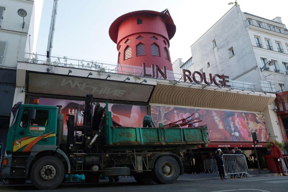 A view of the landmark red windmill atop the Moulin Rouge after the damage (AFP via Getty Images)