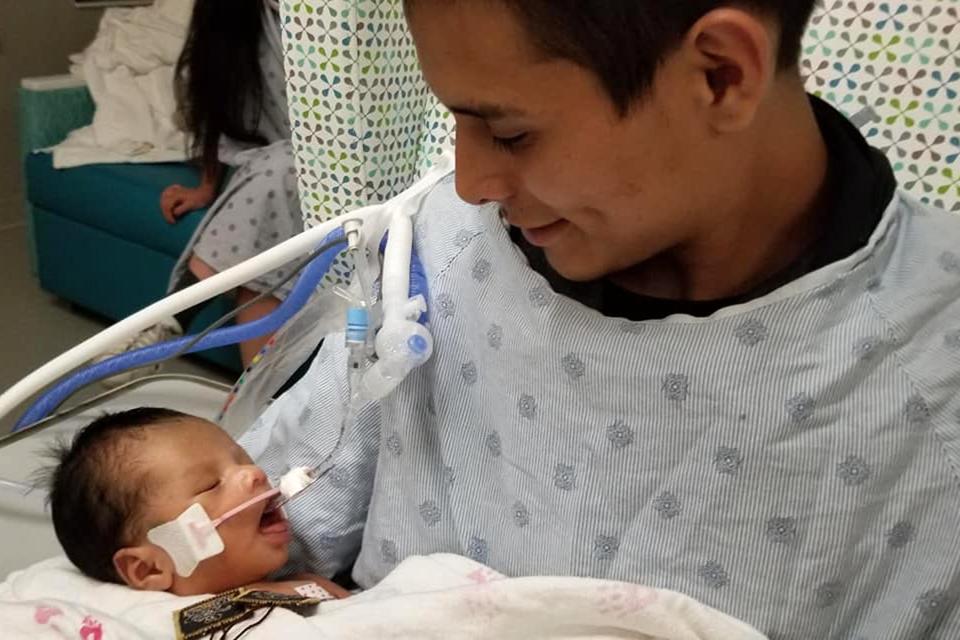 Baby Taken From Slain Mom’s Womb Opens Eyes as Dad Holds Him