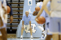 In this photo taken Wednesday, Oct. 2, 2019, North Carolina coach Roy Williams watches his team during an NCAA college basketball practice in Chapel Hill, N.C. (AP Photo/Gerry Broome)