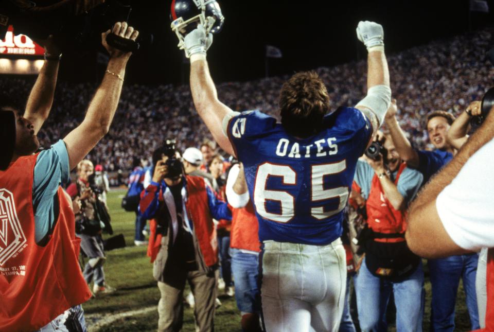 TAMPA, FL - JANUARY 27:  Center Bart Oates #65 of the New York Giants celebrates following the game against the Buffalo Bills during Super Bowl XXV at Tampa Stadium on January 27, 1991 in Tampa, Florida. The Giants defeated the Bills 20-19.  (Photo by George Rose/Getty Images)