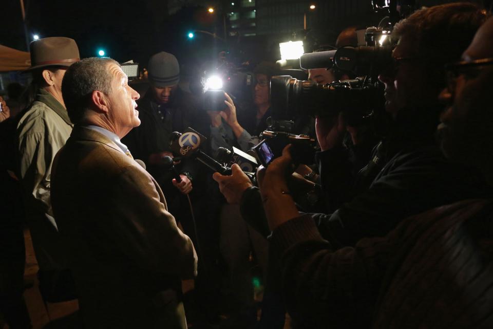Los Angeles County Sheriff's Department spokesman Steve Whitmore speaks to the media after Dr. Conrad Murray was released from jail, in Los Angeles, California October 28, 2013. Murray was released after serving roughly two years of a four-year sentence for involuntary manslaughter in pop star Michael Jackson's death, reported local media. REUTERS/Jonathan Alcorn (UNITED STATES - Tags: CRIME LAW MEDIA)