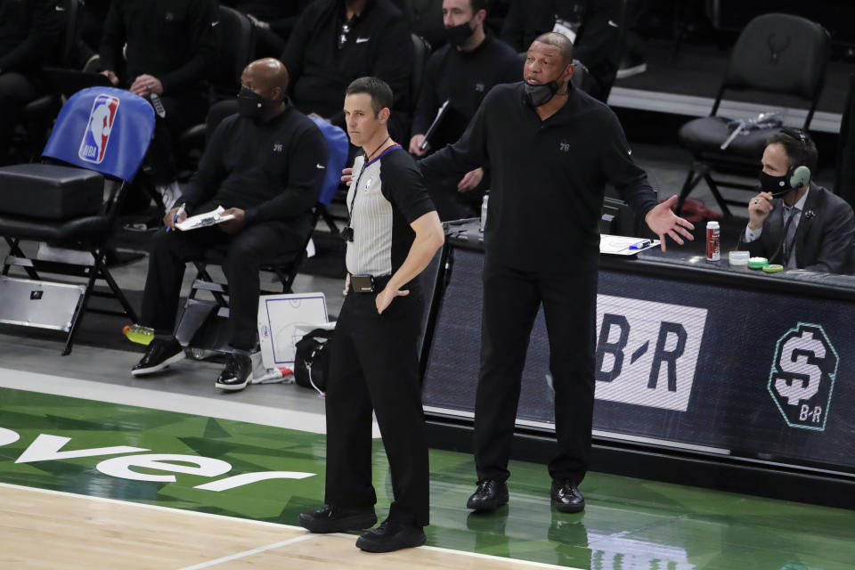 Philadelphia 76ers coach Doc Rivers argues with an official during the second half of the team's NBA basketball game against the Milwaukee Bucks on Thursday, April 22, 2021, in Milwaukee. (AP Photo/Aaron Gash)