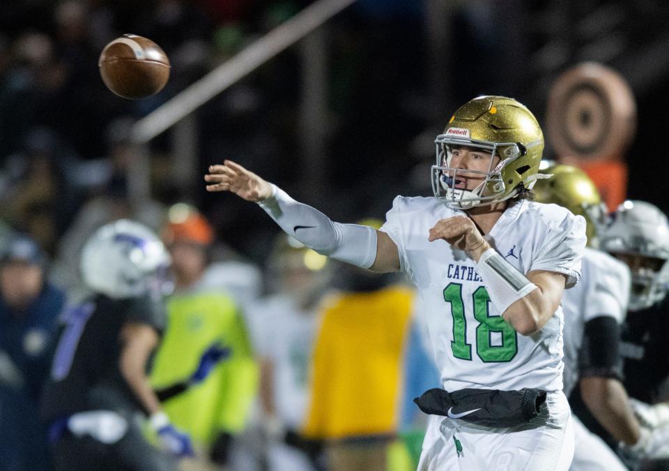 Indianapolis Cathedral High School junior Danny O'Neil (18) passes during the first half of an IHSAA Class 6A Regional football game against Brownsburg High School, Friday, Nov. 11, 2022, at Brownsburg High School.