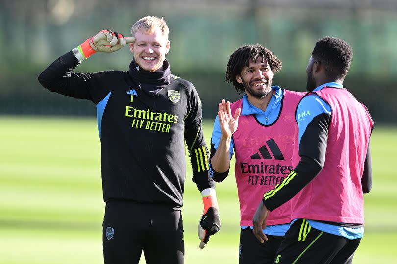 Aaron Ramsdale, Mo Elneny and Thomas Partey of Arsenal during a training session