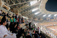 FILE PHOTO: Saudi women watch the soccer match between Al-Ahli against Al-Batin at the King Abdullah Sports City in Jeddah, Saudi Arabia January 12, 2018. REUTERS/Reem Baeshen/File Photo