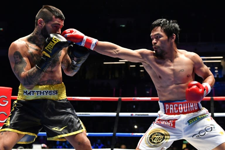 Manny Pacquiao (R) began his professional ring career as a teenager, and in 23 years has compiled a 60-7-2 win-loss-draw record with 39 knockouts