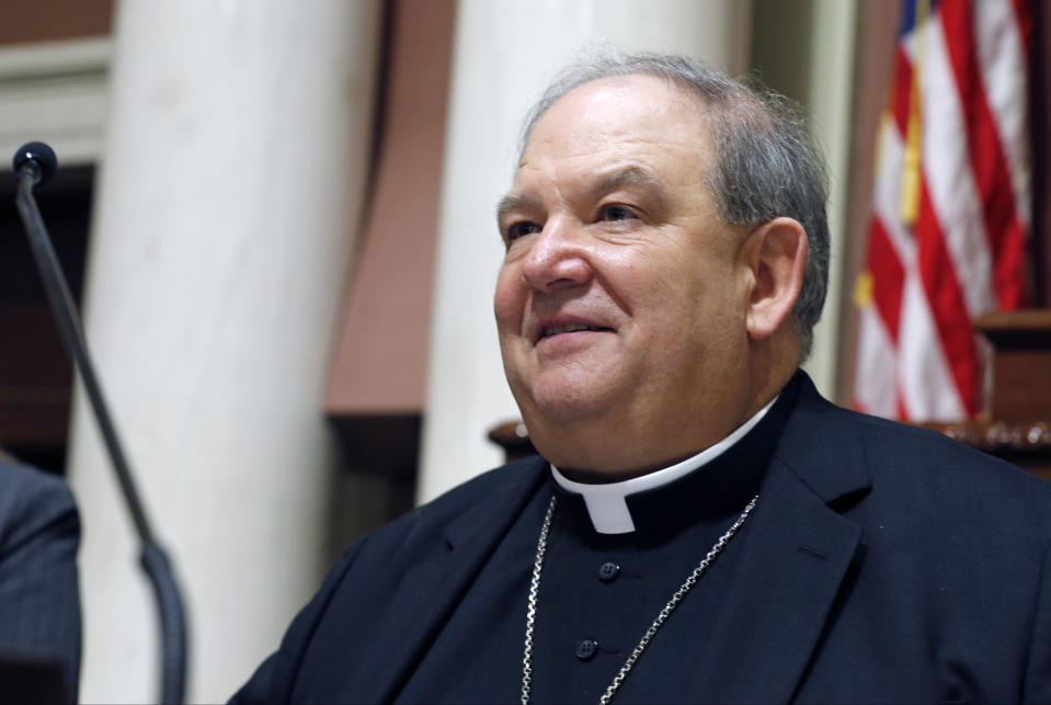 FILE - Bernard Hebda, Archbishop of the Archdiocese of Saint Paul and Minneapolis, smiles after delivering the opening prayer in the Minnesota House as the 2017 Legislature convened Tuesday, Jan. 3, 2017 in St. Paul, Minn. A long Vatican investigation into misconduct allegations against Archbishop John Nienstedt, the former leader of the Archdiocese of Saint Paul and Minneapolis, concluded that he took “imprudent” actions but did not violate church law, the archdiocese announced Friday, Jan. 5, 2024. (AP Photo/Jim Mone, File)