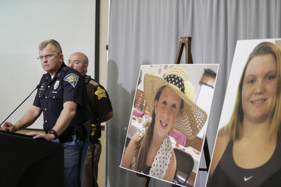 Indiana State Police Superintendent Doug Carter reacts as he speaks during a news conference on an update on the Delphi murders investigation, Monday, April 22, 2019 at the Canal Center in Delphi, Ind. Authorities released video Monday of a man suspected of killing two Indiana teenagers two years ago and urged the public to scrutinize the footage, which shows the man walking on an abandoned railroad bridge the girls visited while out hiking the day they were slain. (Nikos Frazier/Journal & Courier via AP)