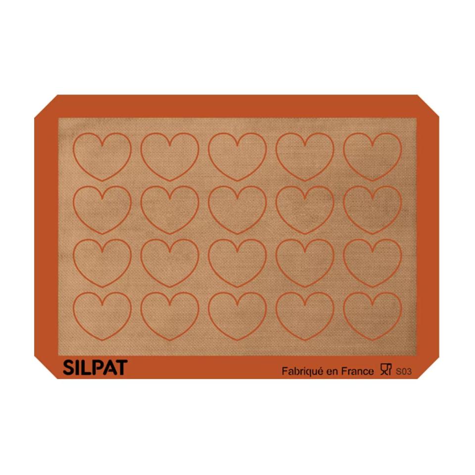 <p><a href="https://go.redirectingat.com?id=74968X1596630&url=https%3A%2F%2Fwww.surlatable.com%2Fsilpat-heart-half-sheet-baking-mat%2FPRO-8054140.html&sref=https%3A%2F%2Fwww.menshealth.com%2Ftechnology-gear%2Fg35256368%2Fvalentines-day-gifts-for-mom%2F" rel="nofollow noopener" target="_blank" data-ylk="slk:Shop Now;elm:context_link;itc:0;sec:content-canvas" class="link ">Shop Now</a></p><p>Heart Half-Sheet Baking Mat</p><p>surlatable.com</p><p>$19.96</p><span class="copyright">Sur La Table</span>