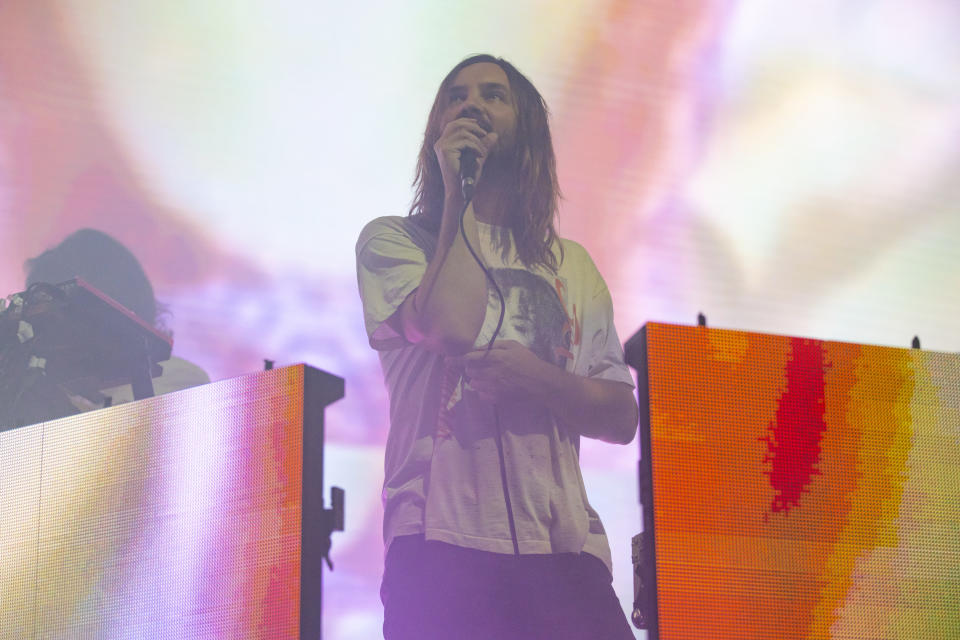 Photo of frontman, Kevin Parker of Tame Impala performing live 