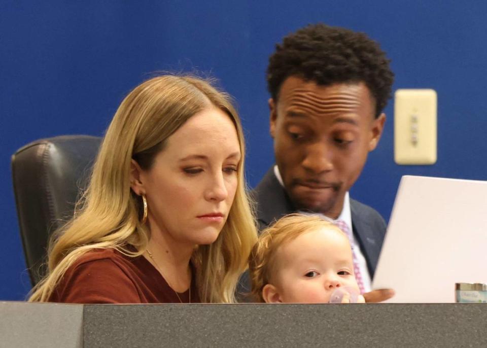 Board member Sarah Leonardi, left, sits with her daughter Lia, center, as Broward School Board discusses the application process for a new superintendent for Broward public schools on Tuesday, May 9, 2023, in Fort Lauderdale, Florida.