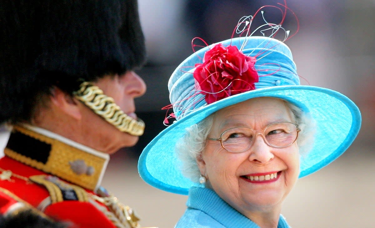 The Queen smiles at the Duke of Edinburgh on Horse Guards Parade during the annual Trooping the Colour parade (Lewis Whyld/PA) (PA Archive)