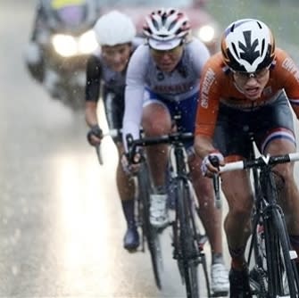 Netherlands' Marianne Vos competes in the women's cycling road race final at the 2012 Summer Olympics on Sunday, July 29, 2012, in London. (AP Photo/Stefano Rellandini, Pool)