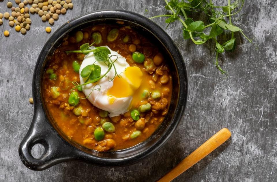 A poached egg bulks up the protein in this spiced soup - Andrew Crowley