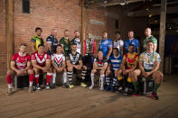 Captains of the competing men's teams pose for a picture at a media event to mark the forthcoming Rugby League World Cup in Manchester, England, Monday Oct. 10, 2022. The tournament which is being hosted in England will begin on Oct. 15. (AP Photo/Jon Super)