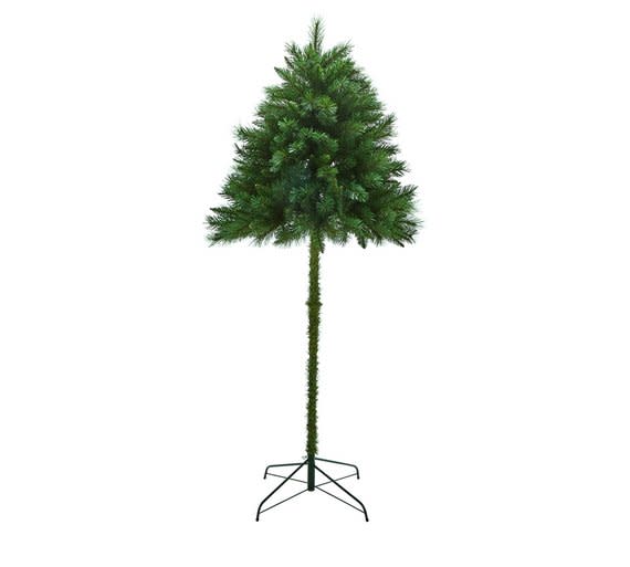 Argos’ ‘half’ tree. The catalogue giant has launched the 6ft artificial tree to help save space at Christmas and keep baubles and lights out of reach of children and pets. (Argos).