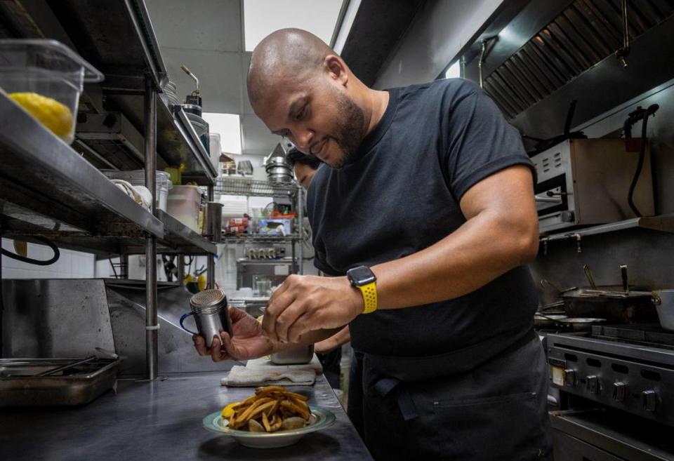 Chef Timon Balloo prepares clam chowder fries at The Katherine in Fort Lauderdale.