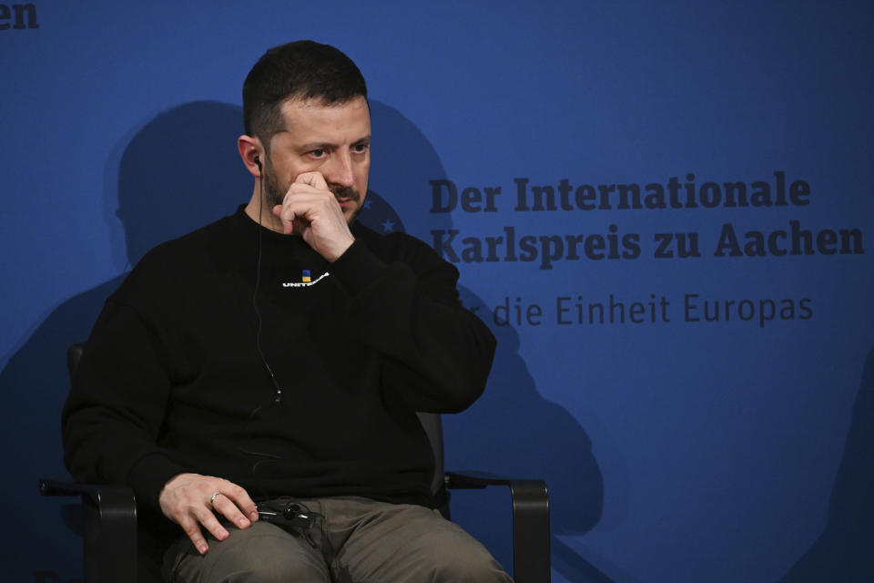 Ukrainian President Volodymyr Zelenskyy attends the award ceremony of the Charlemagne Prize in Aachen, Germany, Sunday, May 14, 2023. Zelenskyy is in Aachen to receive the International Charlemagne Prize, awarded to him and the people of Ukraine. (Federico Gambarini/DPA via AP, Pool)